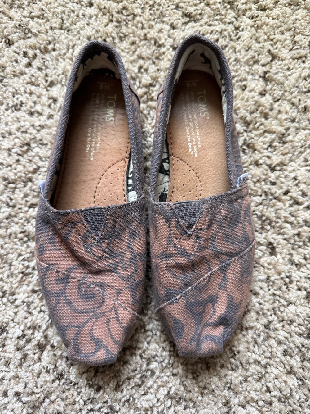 TOMS Women's Brown and Black Patterned Canvas Slip-Ons